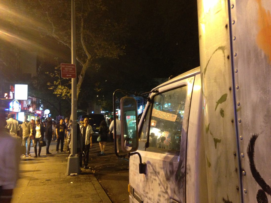 Notice the "No Standing" sign—the truck was left running (Jen Chung/Gothamist)